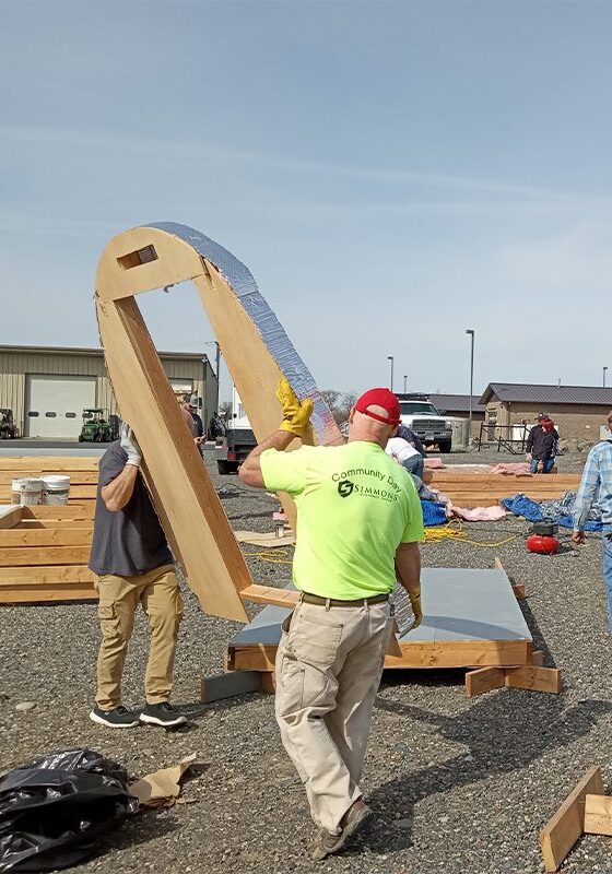 Volunteers constructing shelter unit